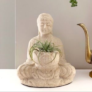 Buddha sculpture made of pressed sand